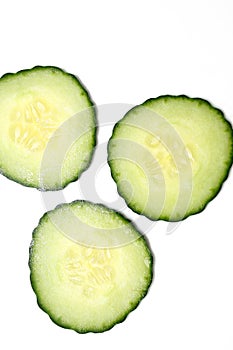 Three cucumber slices