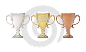 Three cup trophies, gold, silver and bronze.