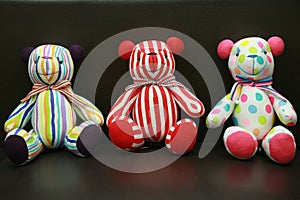 Three cute bears have colorful