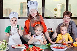 Three cute kids with mom making fruit salad