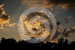 Three-D clouds on the sunset