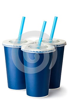 Three dark blue cardboard cups with a straws