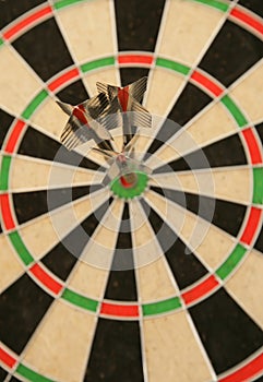 Three darts in bullseye