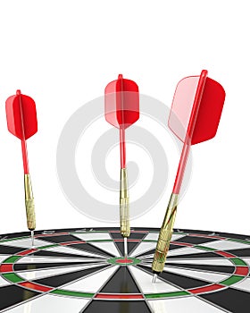 Three darts stuck in a board, top view