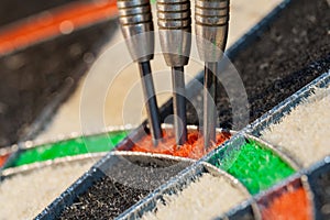 A three darts in triple sector of sisal dartboard