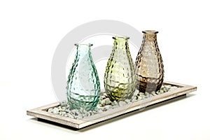 Three Decorative Glass Vases on Stand with Pebbles