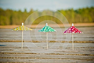 Three decorative umbrellas