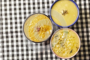 Three delicious hot broths from Brazilian cuisine, cassava, onion and Quenga,