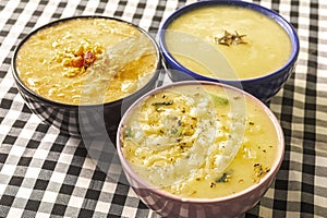 Three delicious hot broths from Brazilian cuisine, cassava, onion and Quenga,