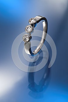 Three diamonds engagement ring