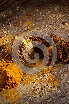 Three different asian spices on a brown table