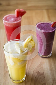 Three different Fruit shakes, watermelon,pinapple and mixed berry