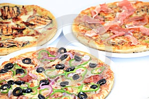 Three different kind of pizzas
