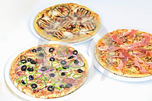 Three different kind of pizzas