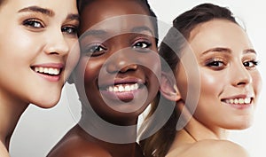 three different nation woman: african-american, caucasian together isolated on white background happy smiling, diverse