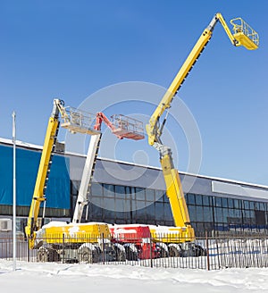 Three different self propelled wheeled boom lift with telescoping booms