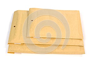 Three different size bubble lined shipping or packing envelopes