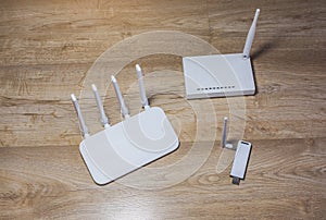 Three different types of Wi-Fi routers, modern and old technology. Wireless ethernet connection signal