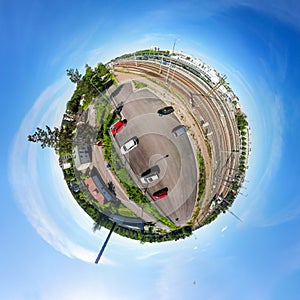 A three dimensional aerial panoramic view of Kouvola railway station, car parking and city center