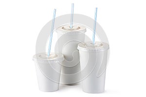 Three disposable cups for beverages with straw