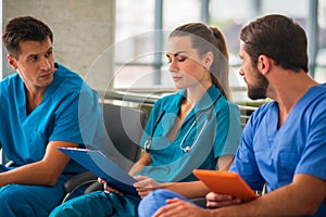 Three doctors having an changeover and feeling good