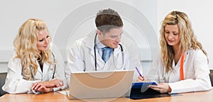 Three doctors at a meeting