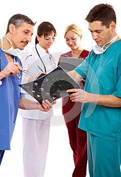 Three doctors and nurse