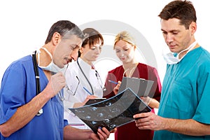 Three doctors and nurse