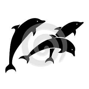 Three dolphins. Vector black silhouettes.