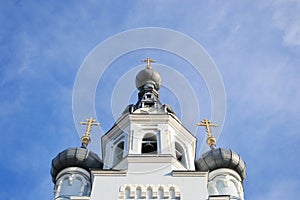 Three domes on blue sky background