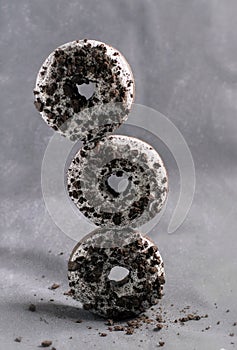 Three donuts stacked on top of each other