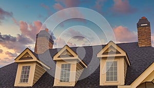 Three Dormers and Two Brick Chimneys