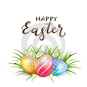 Three Easter eggs in grass