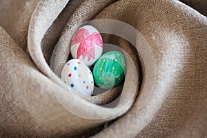 Three Easter eggs in a nest