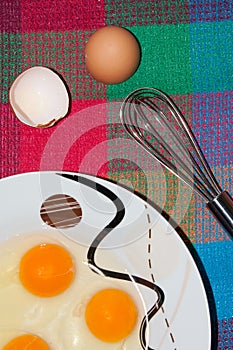Three eggs in the plate