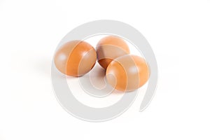 Three eggs on white background