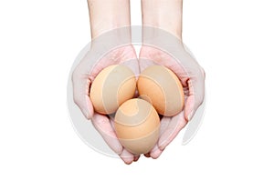 Three eggs in women hands