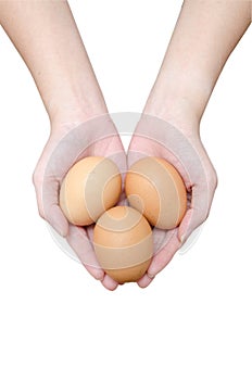 Three eggs in women hands