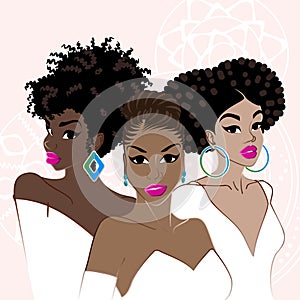 Three elegant dark-skinned women photo
