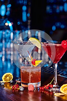 three elegant delicious cocktails on counter