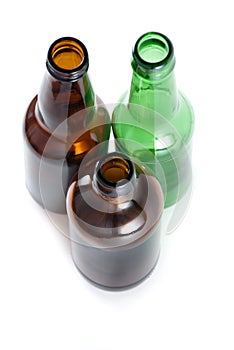 Three emplty beer bottles on isolated backround.