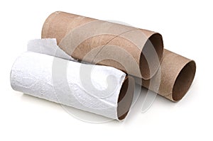 Three emptiness toilet paper rolls on white photo