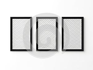 Three empty picture frames isolated on white background
