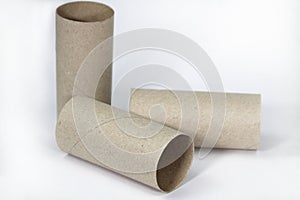 Empty toilet paper roll on white background photo