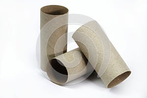 Empty toilet paper roll on white background photo
