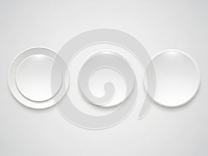 Three empty white ceramic plates