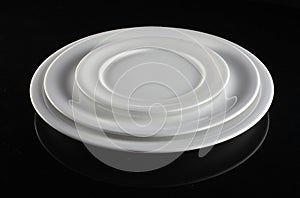 Three Empty white plates