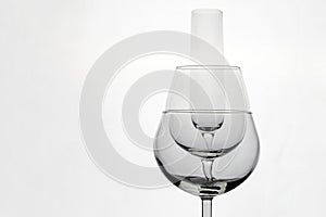 Three empty wineglasses diffrent shape on whete background with copy space
