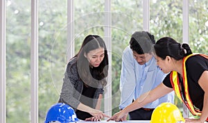 Three engineers working meeting room at the office. Three worker