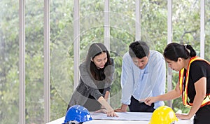 Three engineers working meeting room at the office. Three worker